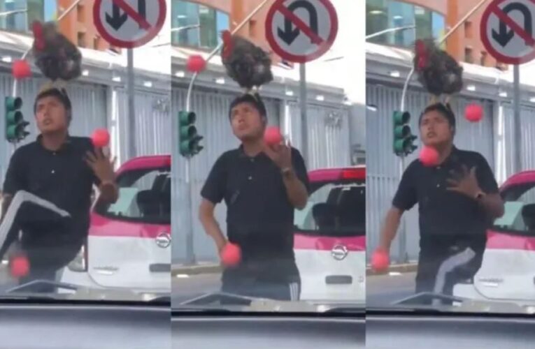 Malabarista sorprenden con un gallo en la cabeza y se hace viral